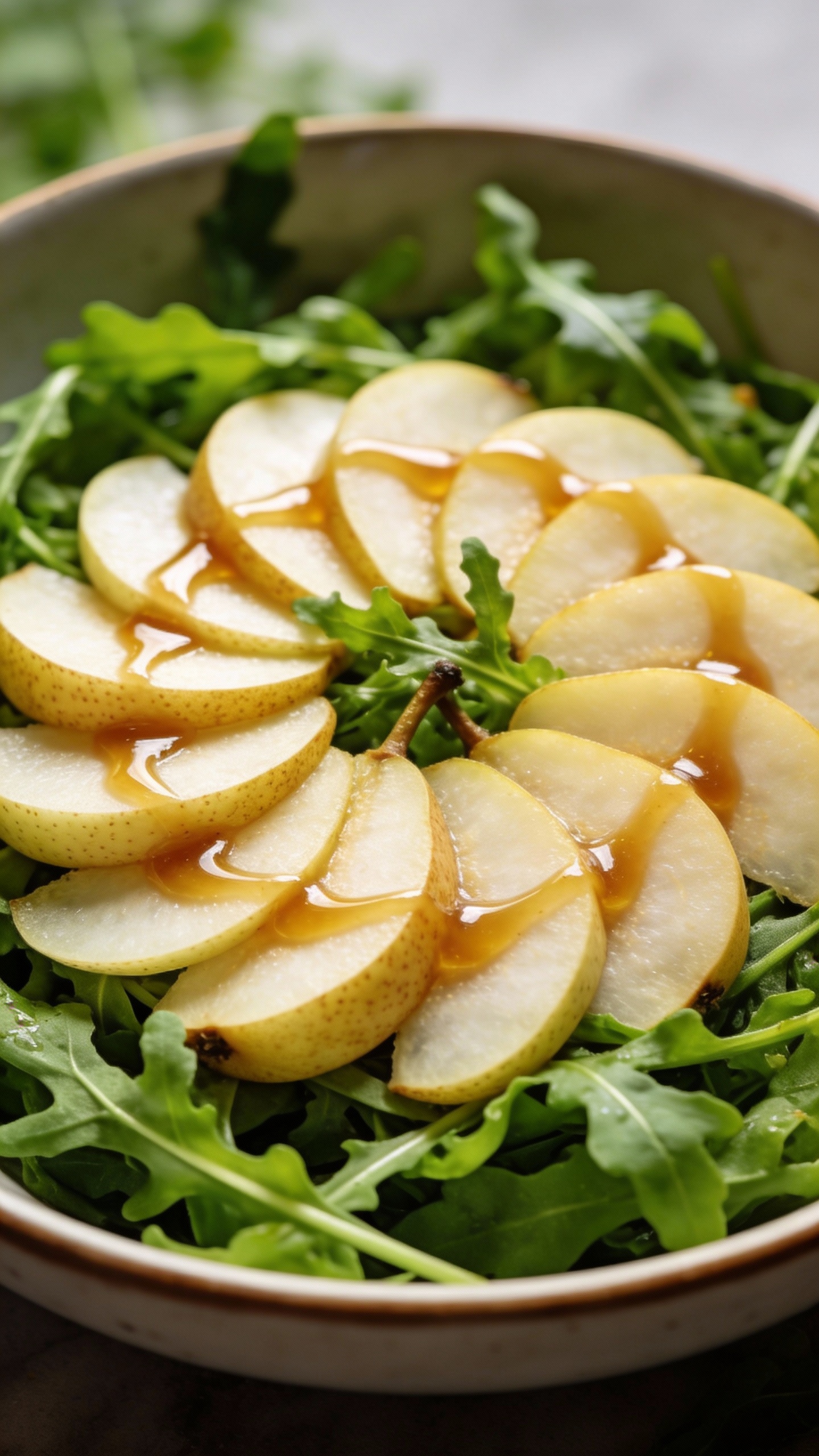 pear salad with arugula, bosc slices, silky vinaigrette drizzle